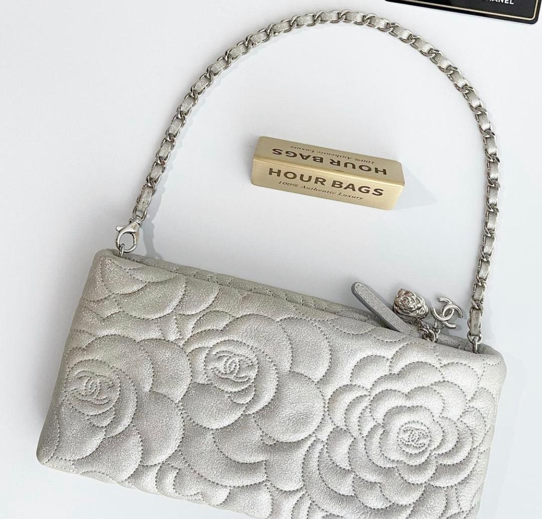 Rare Authentic Chanel Silver Patent Vinyl Camellia Graphic Edge Embossed  Flap Bag, Luxury, Bags & Wallets on Carousell