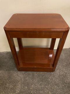 Small wooden cabinet on wheels
