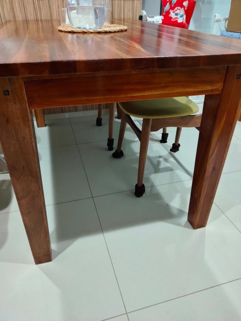 Solid teak dining table (Category: Tables & Sets) located in Singapore. Submitted by angelhshop (Listing ID 1100128715, Image 2). Description: 1.5m dining table very good solid wood beautiful wood grains seats 6 pax comfortably 150 X 90 X 77cm to arrange delivery on your own.