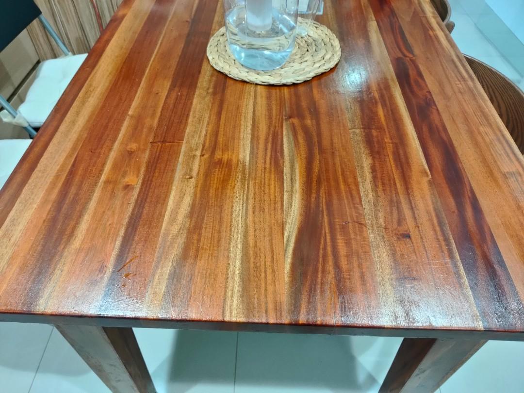 Solid teak dining table (Category: Tables & Sets) located in Singapore. Submitted by angelhshop (Listing ID 1100128715, Image 3). Description: 1.5m dining table very good solid wood beautiful wood grains seats 6 pax comfortably 150 X 90 X 77cm to arrange delivery on your own.