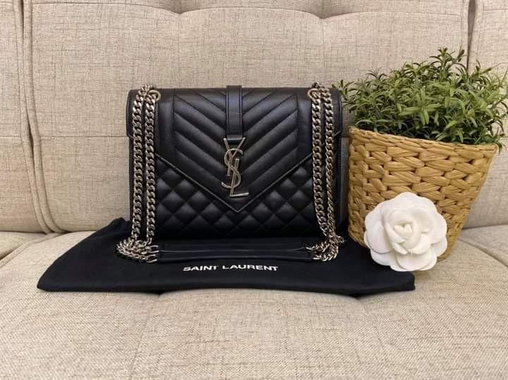 YSL Envelope Medium Grained De Poudre SHW (Category: Luxury Bags & Wallets) located in Manila. Submitted by bagislifeshop (Listing ID 1099958204, Image 3). Description: Cool!!! Too Cute 🖤🖤🖤 On Hand in PH🇵🇭 100% Authentic YSL Envelope Medium Grained de Poudre SHW Condition: 9/10 Comes with Dustbag.