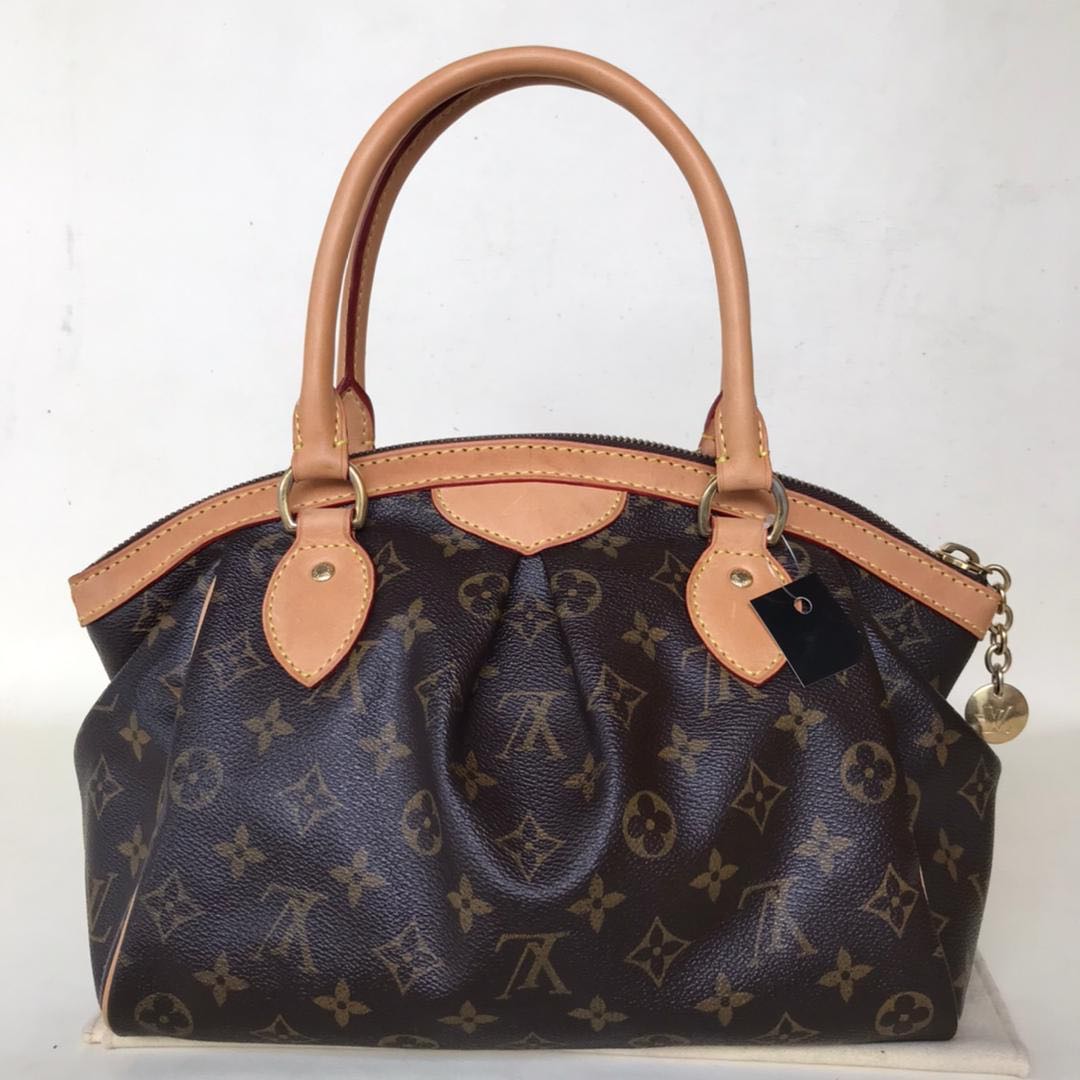 Louis Vuitton Tivoli ( Patina Leather ).URGENT SALE OCT !!!, Luxury,  Bags & Wallets on Carousell