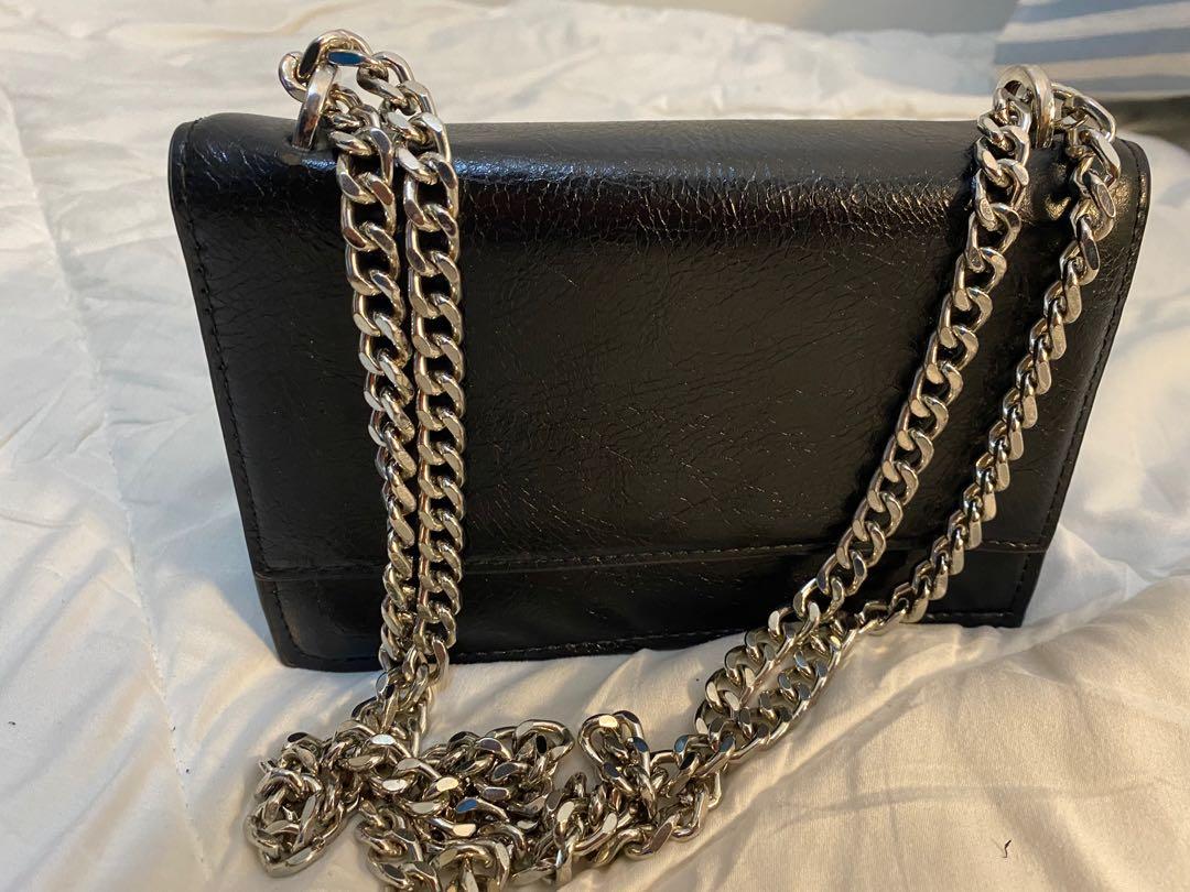 Black sling bag shop with silver chain