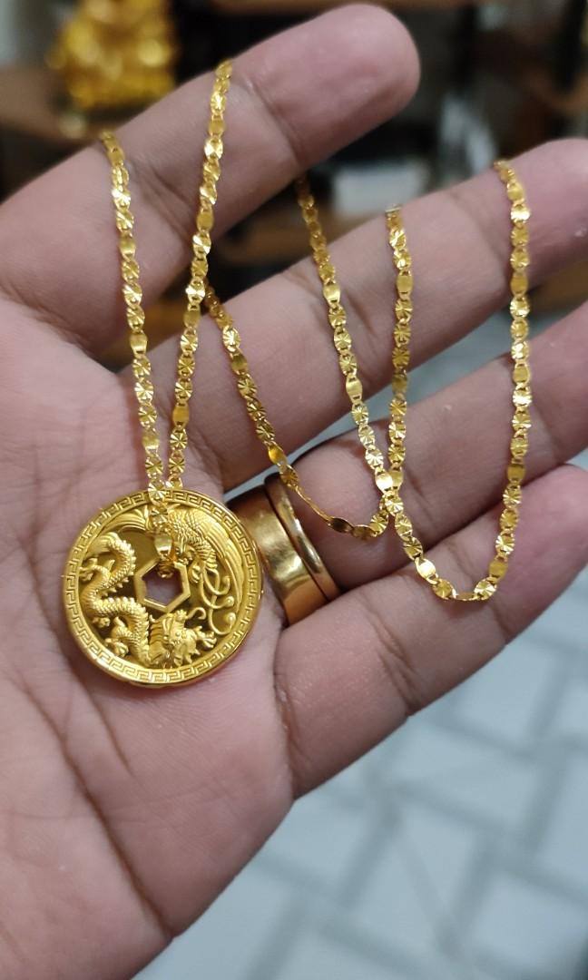 18k gold chain with 24k gold pendant 