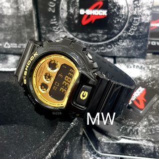 G shock black on sale and gold mens watch