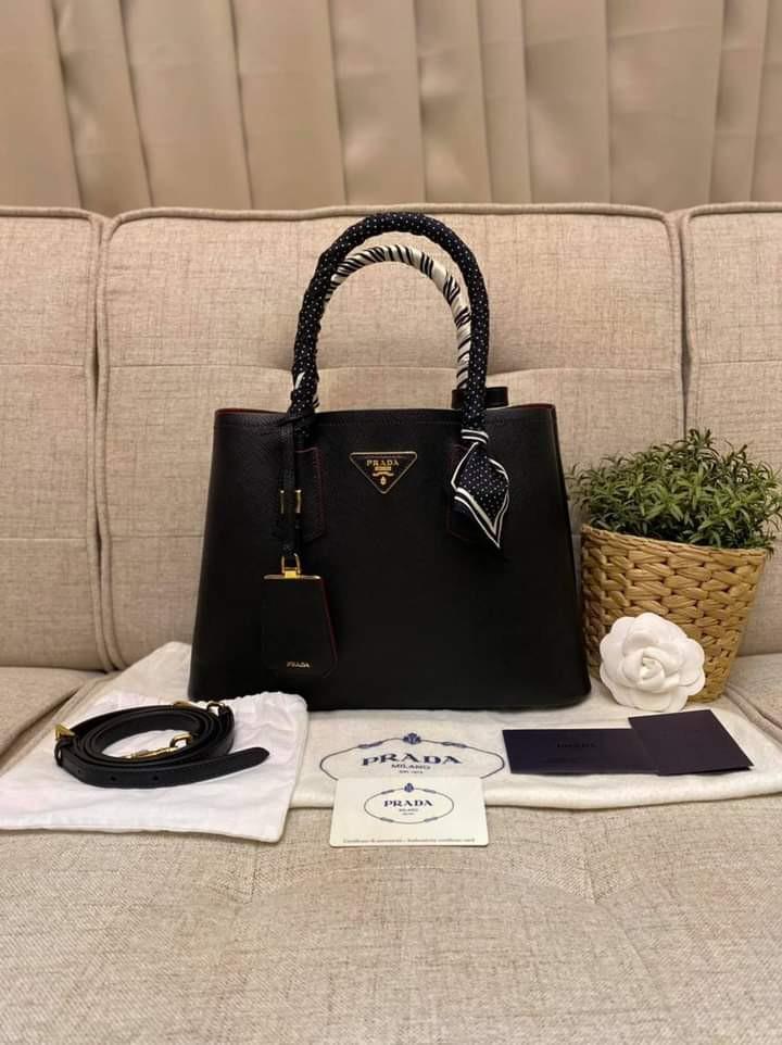 Prada Saffiano Cuir Double Bag (Category: Luxury Bags & Wallets) located in Manila. Submitted by bagislifeshop (Listing ID 1100590632, Image 1). Description: Sophisticated and Feminine 🥰🥰🥰 On Hand in PH 100% Authentic Prada Saffiano Cuir Double Bag Condition: 9/10 Comes with Dustbag, Authenticity Card, Clochette, Booklet, Strap and Free Twilly.