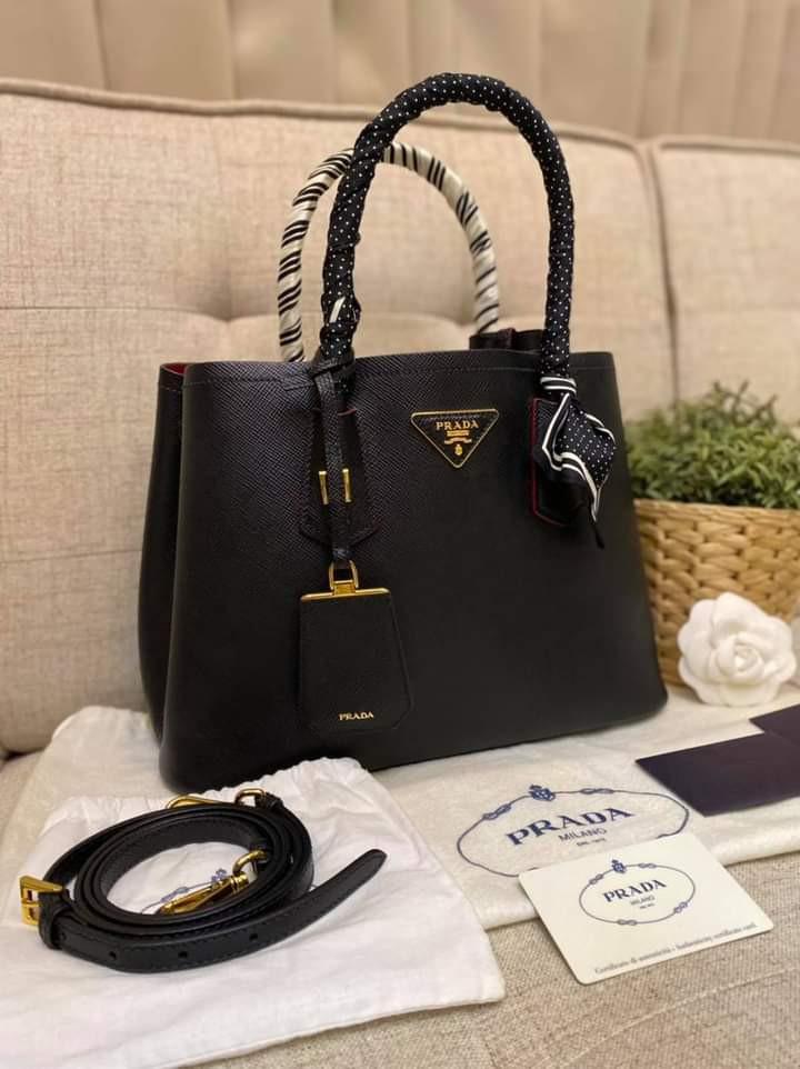 Prada Saffiano Cuir Double Bag (Category: Luxury Bags & Wallets) located in Manila. Submitted by bagislifeshop (Listing ID 1100590632, Image 2). Description: Sophisticated and Feminine 🥰🥰🥰 On Hand in PH 100% Authentic Prada Saffiano Cuir Double Bag Condition: 9/10 Comes with Dustbag, Authenticity Card, Clochette, Booklet, Strap and Free Twilly.