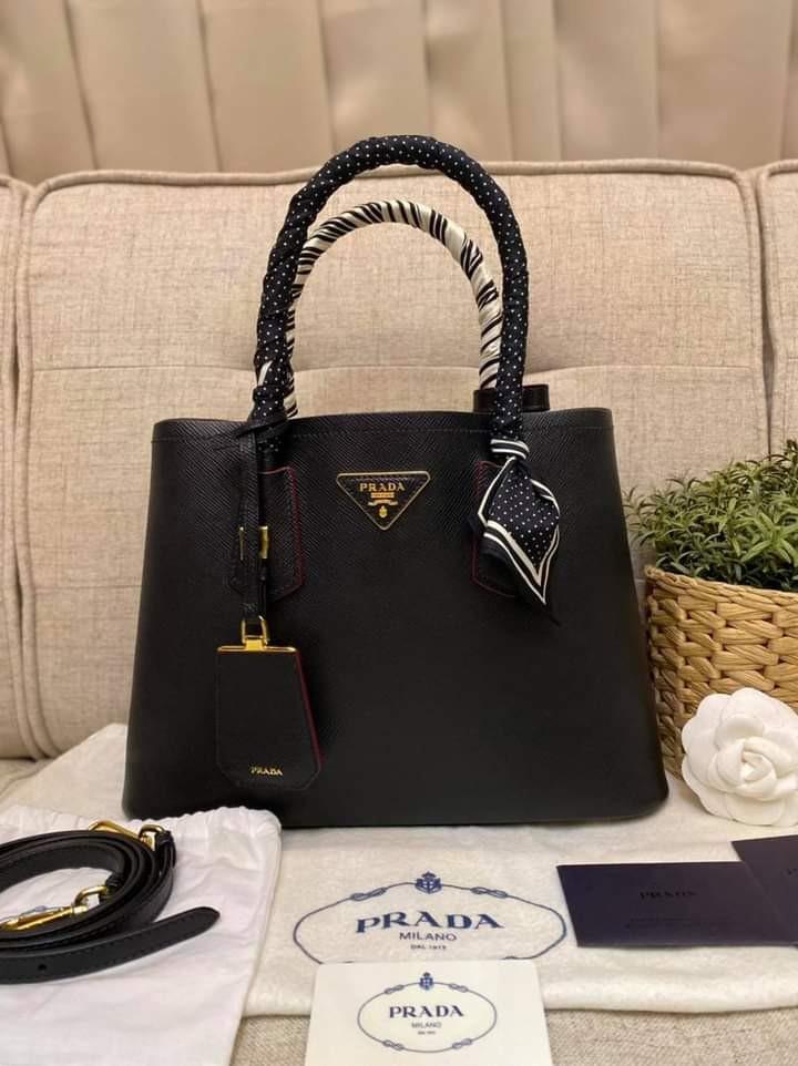 Prada Saffiano Cuir Double Bag (Category: Luxury Bags & Wallets) located in Manila. Submitted by bagislifeshop (Listing ID 1100590632, Image 3). Description: Sophisticated and Feminine 🥰🥰🥰 On Hand in PH 100% Authentic Prada Saffiano Cuir Double Bag Condition: 9/10 Comes with Dustbag, Authenticity Card, Clochette, Booklet, Strap and Free Twilly.