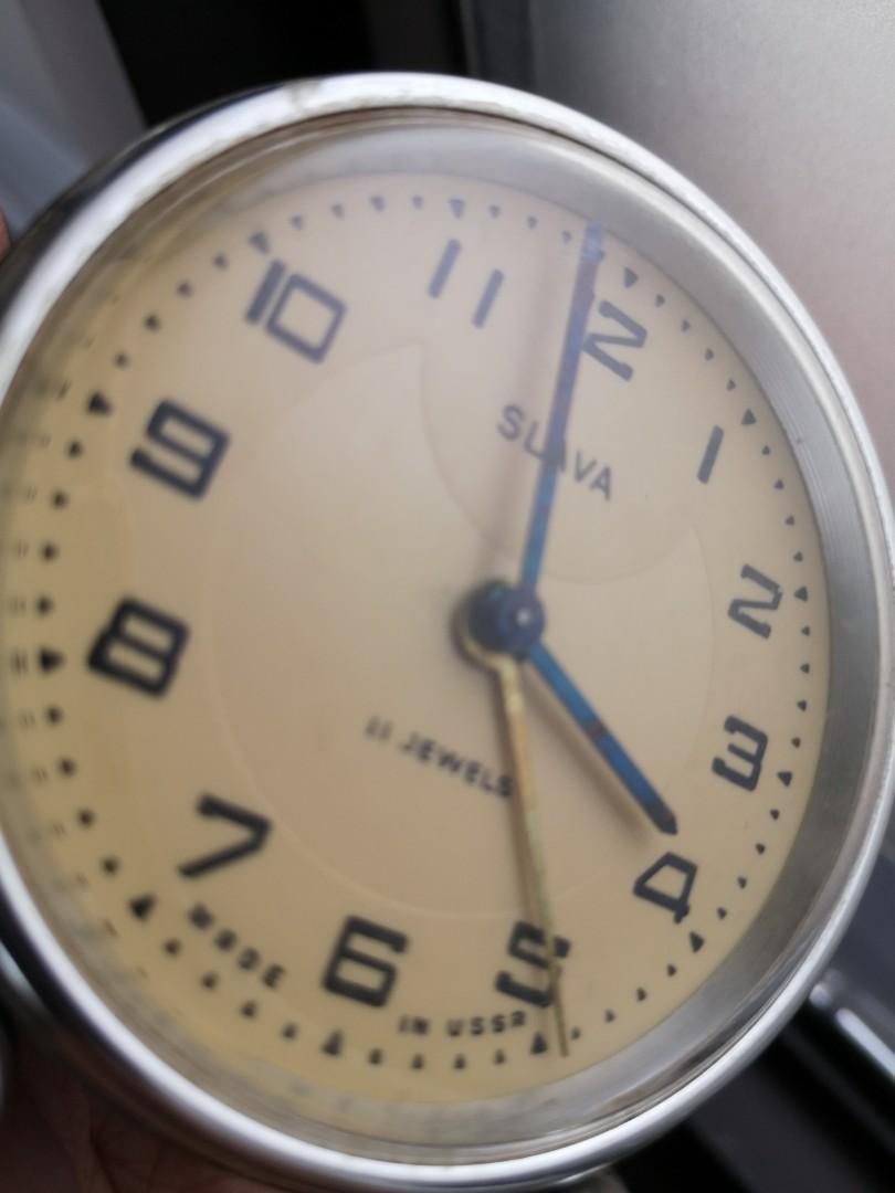 Russian Clock SLAVA Alarm Bell Table Bedside (Category: Clocks) located in Manila. Submitted by leo.7 (Listing ID 1100468221, Image 1). Description: SLAVA Mechanical Alarm clock ⏰ Russian Made 11 jewels 50s-60s Very good working order Including bell alarm Nice consistent patina from European weather Great condition on dial and Arabic numerals "Made in USSR" written in English (Exported to Europe) 🏠🏚️🏰 Recently serviced Obtained from Austrian V