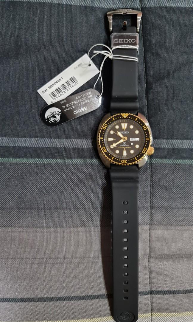 Seiko black and 2025 gold