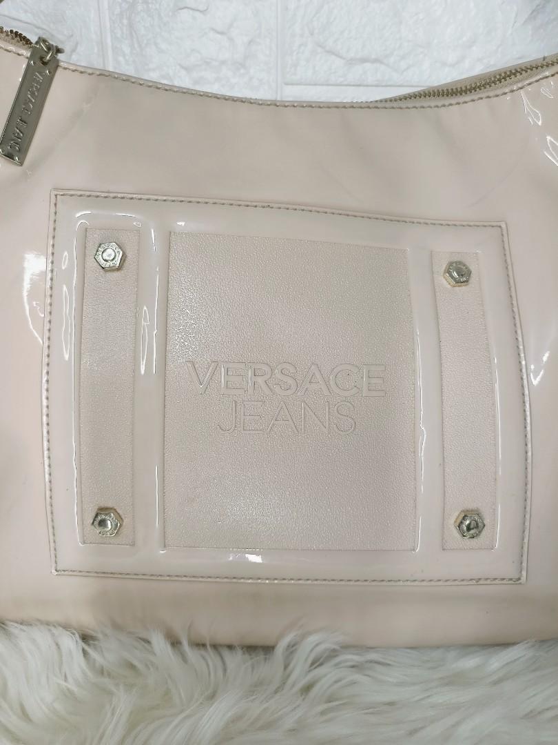 Versace Jeans Beige Patent Bag (Category: Luxury Bags & Wallets) located in Cavite. Submitted by b.f.b (Listing ID 1100577495, Image 2). Description: Versace Jeans Patent Bag Size: L-11 inches W- 13 inches Handle drop - 8 inches Gold Hardware Minimal stain in leather and in inside lining Condition: 8/10.