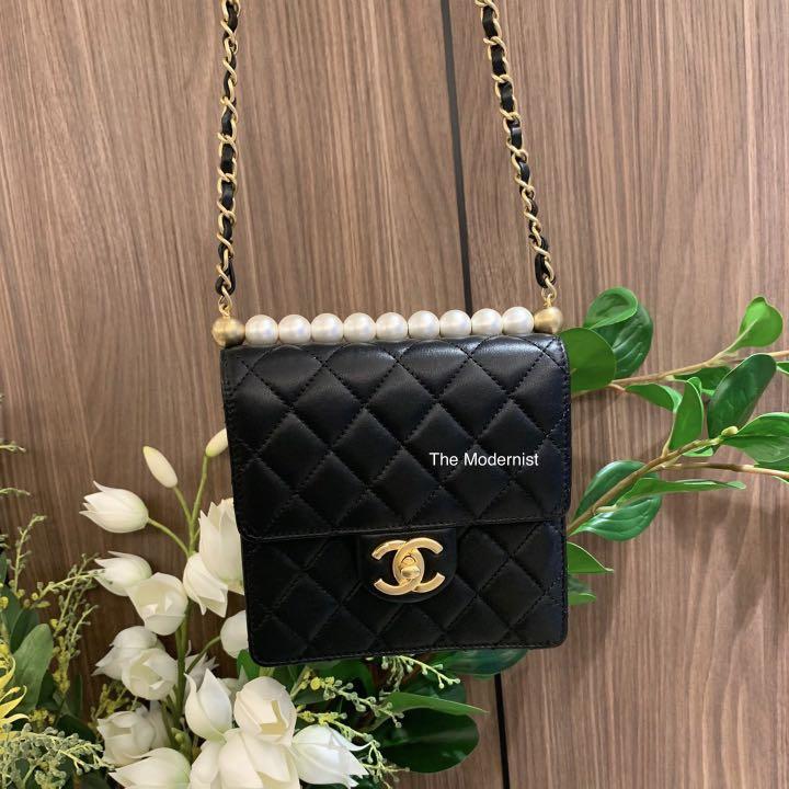 Authentic Chanel Pearl Vertical Clutch Flap Bag With Chain Black