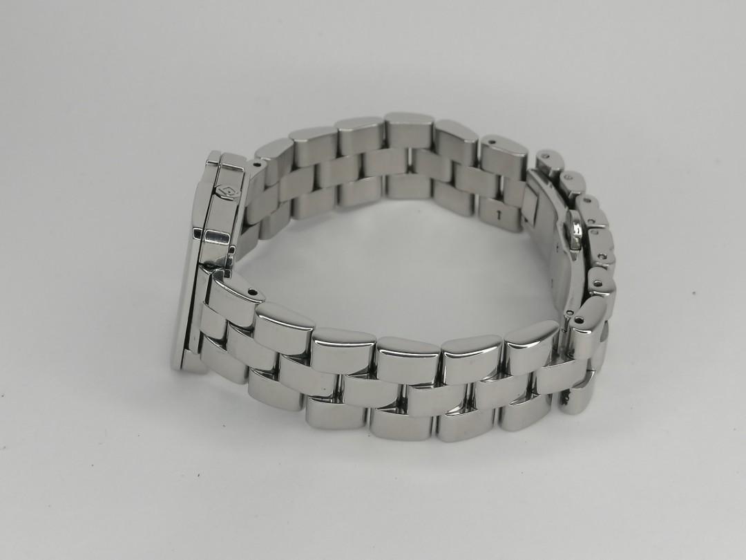 Authentic GUCCI G ladies watch (Category: Women's Watches) located in Manila. Submitted by deejaymoh (Listing ID 1100777159, Image 2). Description: Authentic GUCCI ladies watch Swiss made G model Long bracelet Newly replace original battery.