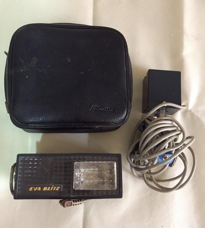 1970s Minette EVA Blitz 3A Electronic Flash (Category: Flashes) located in Paranaque City. Submitted by jobatskifinds (Listing ID 1100778356, Image 3). Description: This item is a transistorized electronic flash from the 70s that is Japan-made. The vintage item is untested and is safe to assume that it is for display purposes only. It still has the leather case and power cord. The item does not have any chips, cracks or any obvious sign of misuse