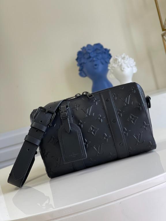 Louis Vuitton City Keepall Bag Monogram Seal Leather Black