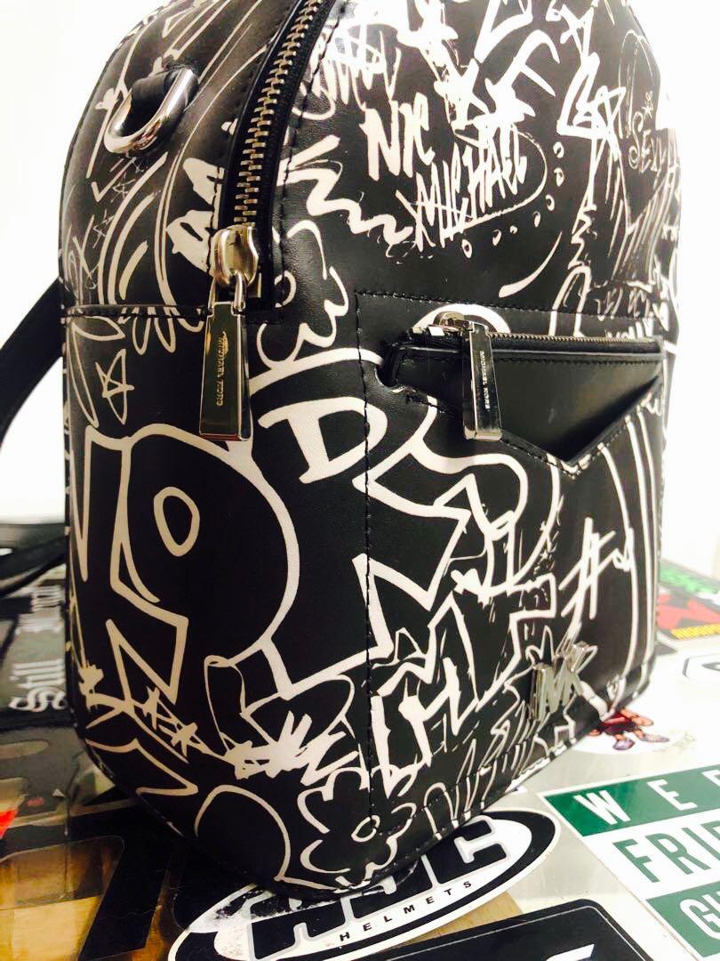 Michael kors 2025 graffiti backpack
