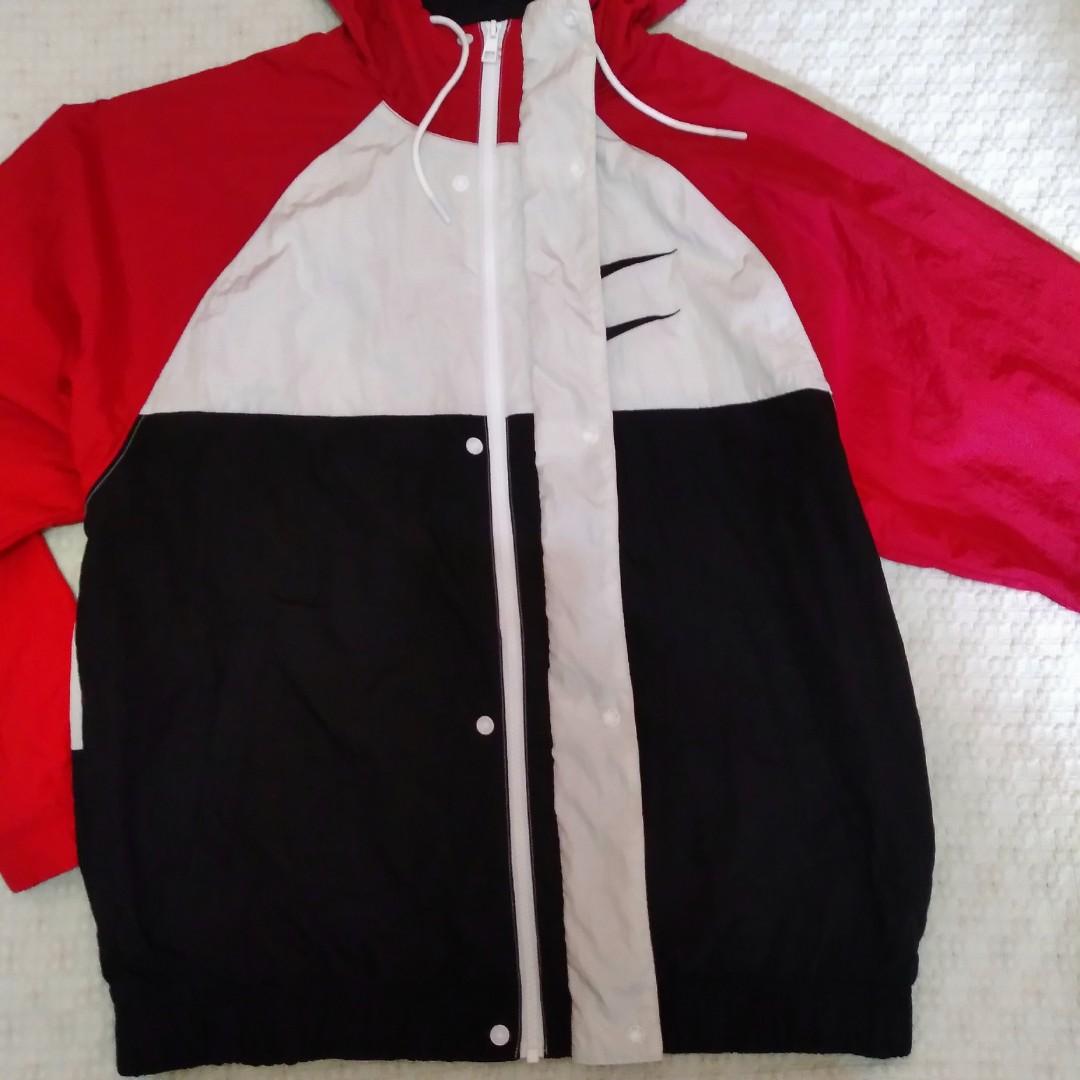 swoosh windbreaker