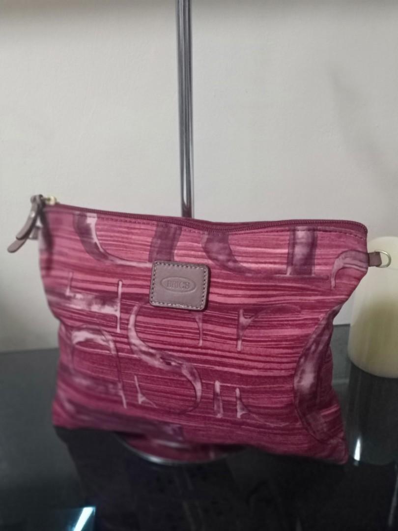 Bric's Milano Pouch (Category: Luxury Bags & Wallets) located in Quezon City. Submitted by lamoure_demavie (Listing ID 1101118773, Image 3). Description: -preloved -lim.edition -rare -small(approx.:10.5 in length) -silk nylon fabric -with optional sling slots -with back snap lock(if use as extra compartment for your bag) -signs of use.