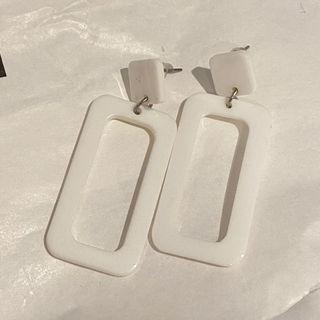 White funky earrings