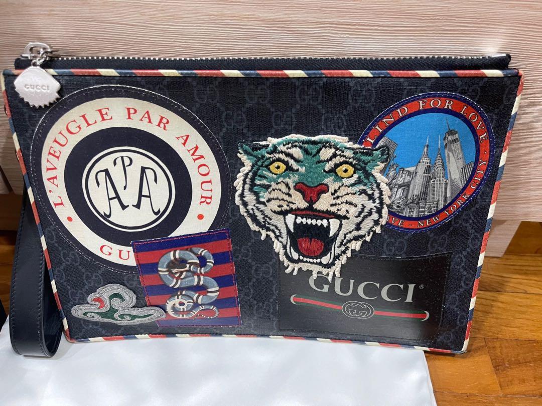 Gucci Night Courrier GG Supreme Pouch Clutch