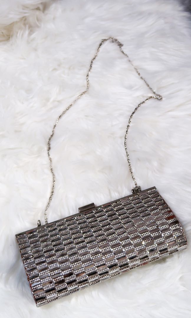 silver hard clutch bag