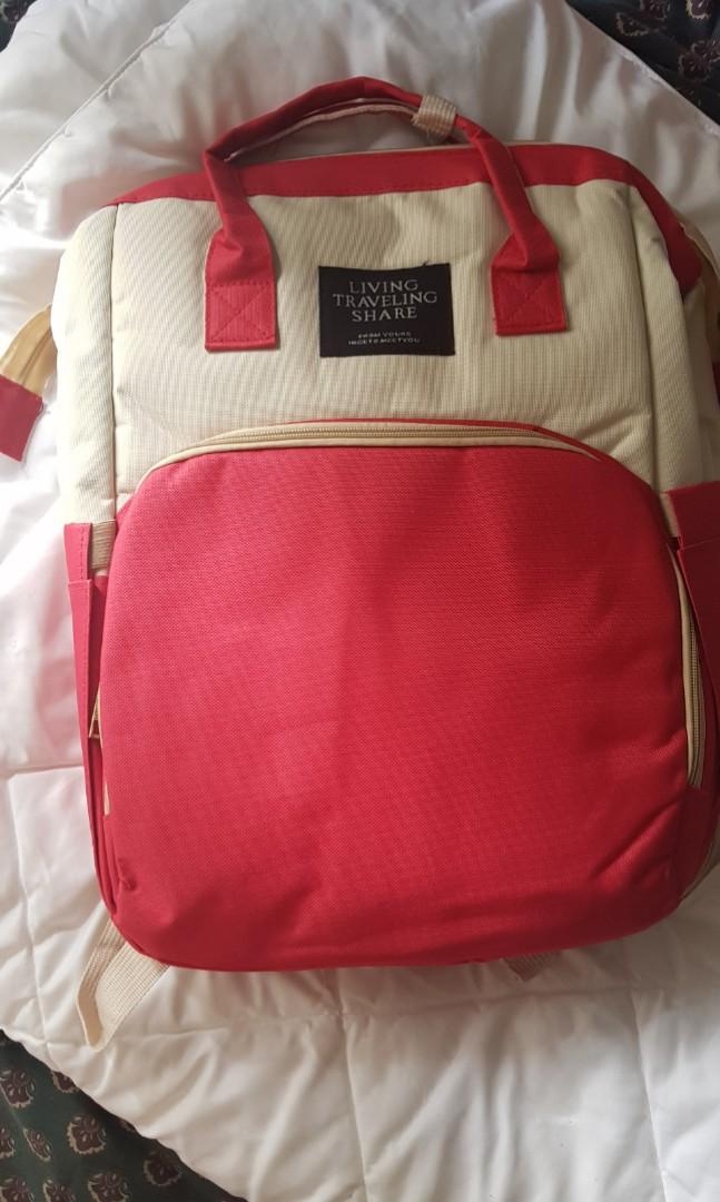 2 in 1 Baby Back Pack + Changing Station (Category: Diaper Bags & Wetbags) located in Mandaluyong City. Submitted by katwomann (Listing ID 1101513735, Image 1). Description: diaper bag that converts into a bed / changing mat opened just to take pics and check complete inclusions rfs: gifted, already have a diaper bag pick up / shipping from Ortigas Center.