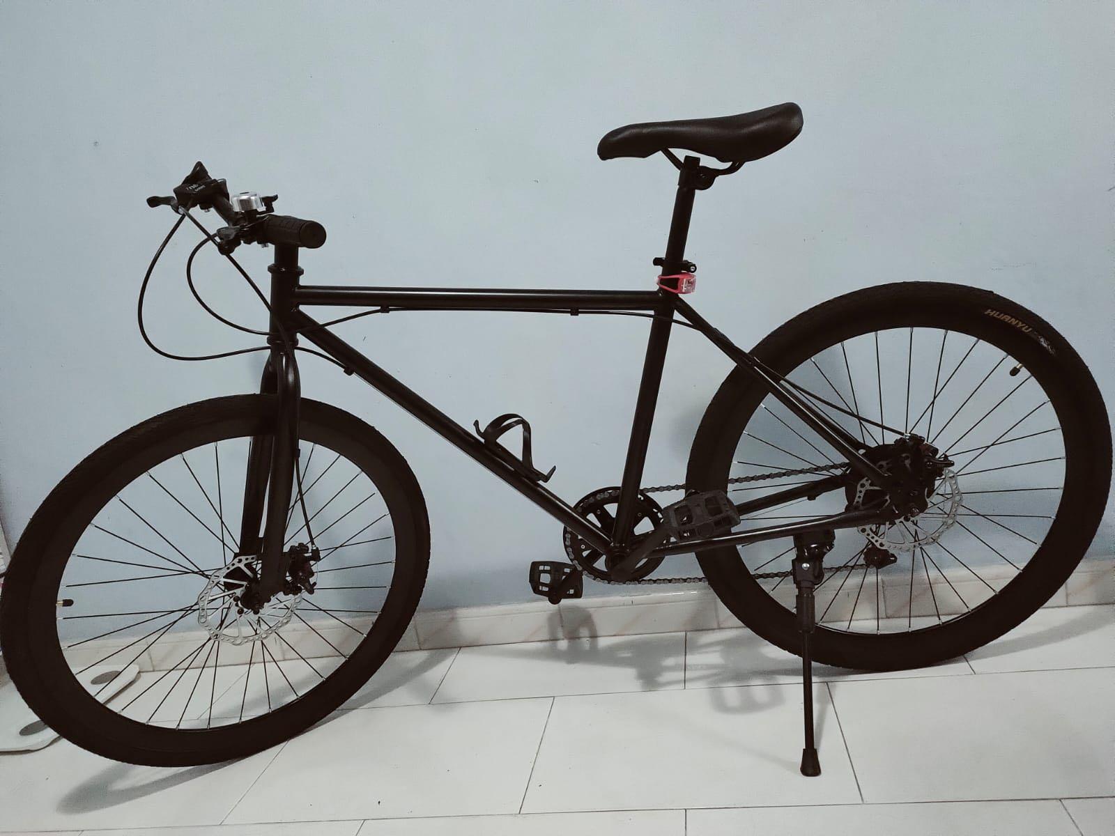Matte black hybrid bike store