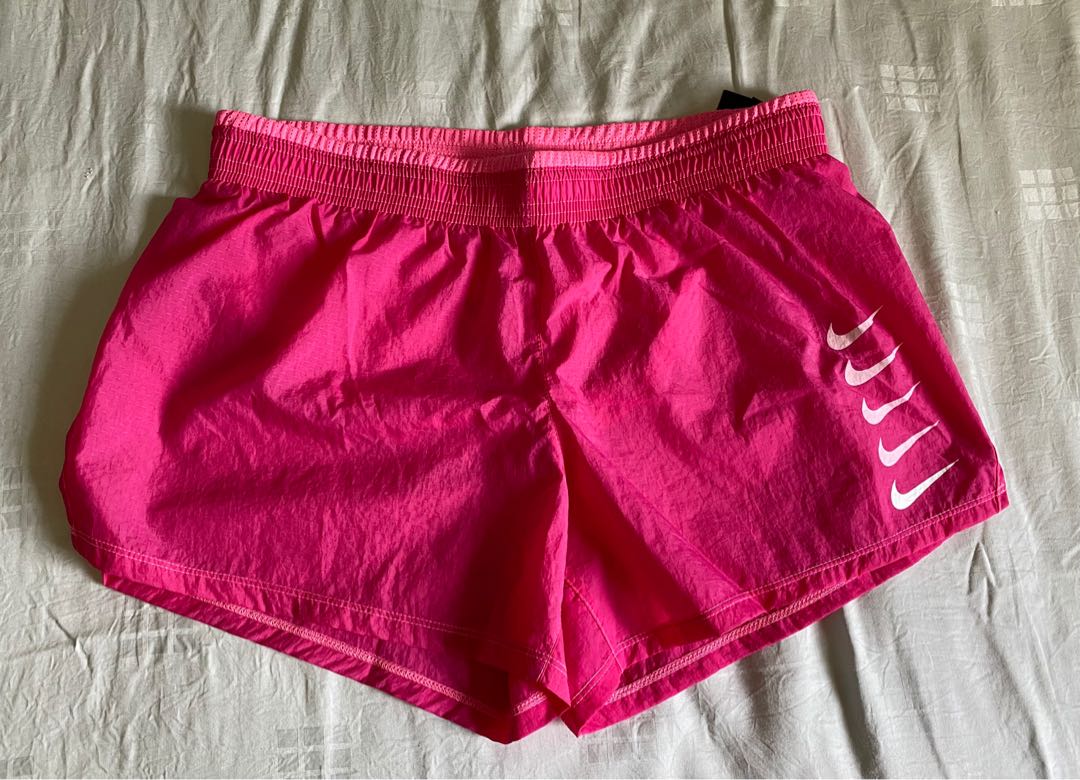 Nike Running Swoosh Shorts in pink 