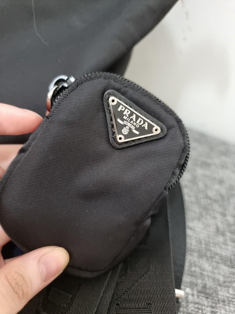 Prada Nylon Bag (Category: Luxury Bags & Wallets) located in Paranaque City. Submitted by mcra_ (Listing ID 1101496202, Image 2). Description: Prada Nylon Two Way Bag Thick Strap with Purse Shoulder Bag Used but in good condition Top Grade Quality Fake po ito 😊.