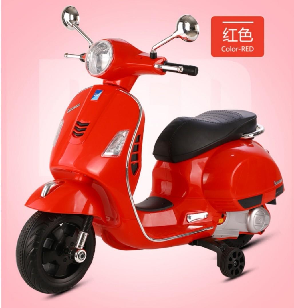 Childs electric vespa scooter store
