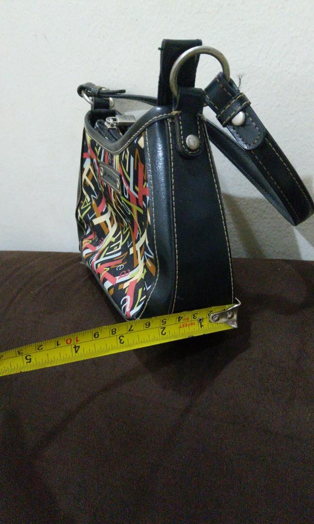 Authentic Anne Klein Bag (Category: Purses & Pouches) located in Manila. Submitted by mediumcloset (Listing ID 1101841097, Image 3). Description: Original and authentic Anne Klein bag from the US given as a gift. You can have the authenticity checked in a store or specialist if you want. It's been in storage for more than a decade and it still holds up! A testament to its quality. Flaws: Needs cleaning from a reputable bag service like Doctor Lea
