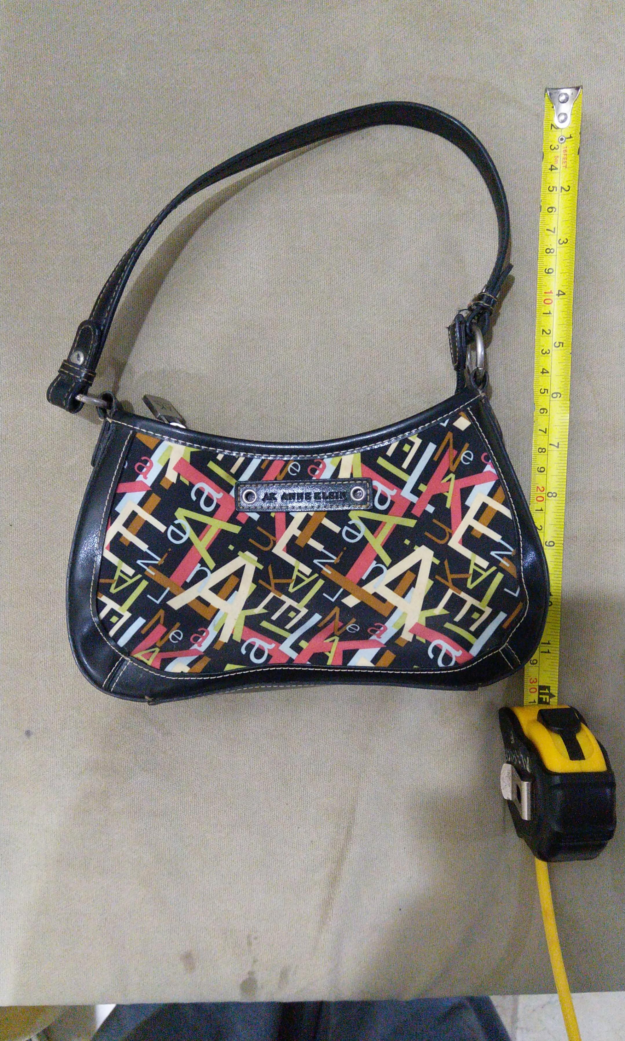 Authentic Anne Klein Bag (Category: Purses & Pouches) located in Manila. Submitted by mediumcloset (Listing ID 1101841097, Image 2). Description: Original and authentic Anne Klein bag from the US given as a gift. You can have the authenticity checked in a store or specialist if you want. It's been in storage for more than a decade and it still holds up! A testament to its quality. Flaws: Needs cleaning from a reputable bag service like Doctor Lea