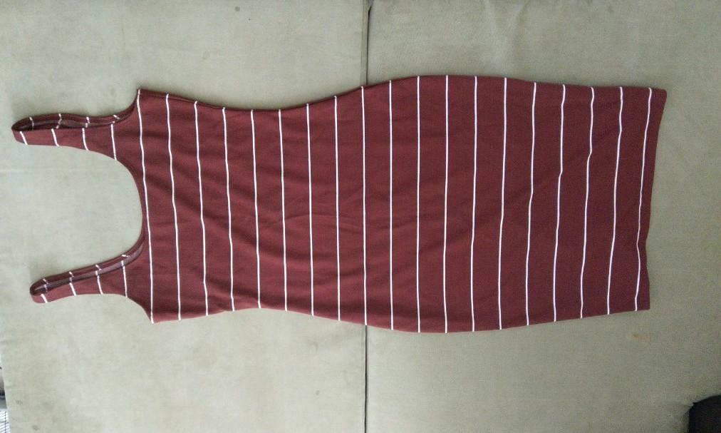 Cotton On stripe bodycon (Category: Dresses) located in Manila. Submitted by mediumcloset (Listing ID 1101789830, Image 1). Description: Used only once. Given as a gift. Colors is something like terracota. Size medium, body hugging and knee length for a 5'2" height. Haven't used it in so long so I'm selling it. No damages nor flaws..