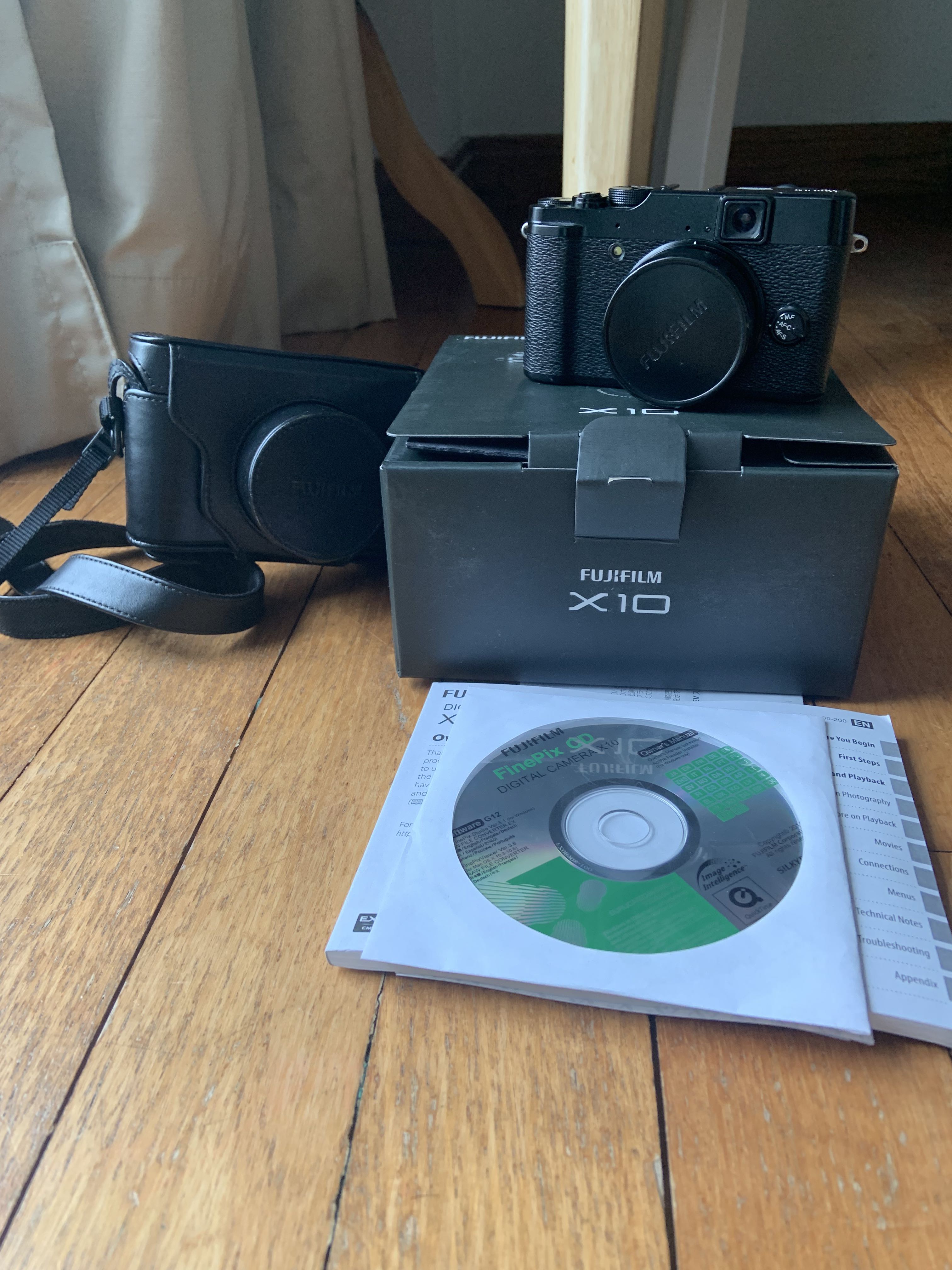 Fujifilm x10 camera with case, battery and charger, Photography