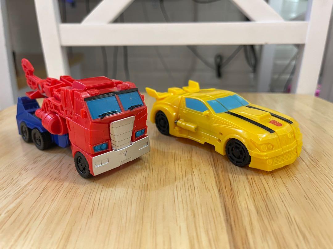 OPTIMUS & BUMBLEBEE set (Category: Action & Battle Toys) located in Quezon City. Submitted by transformworld28 (Listing ID 1101861773, Image 2). Description: OPTIMIS PRIME BUMBLEBEE AUTHENTIC HASBRO NEW NO BOX SALE !! 850 php Package sale Robot mode to car mode Robot mode to truck mode Collectible TRANSFORMERS FOR KIDS .