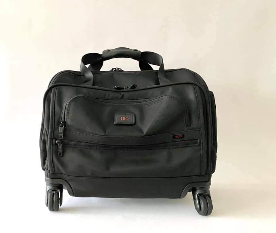 Tumi alpha 2 store 4 wheeled compact duffel