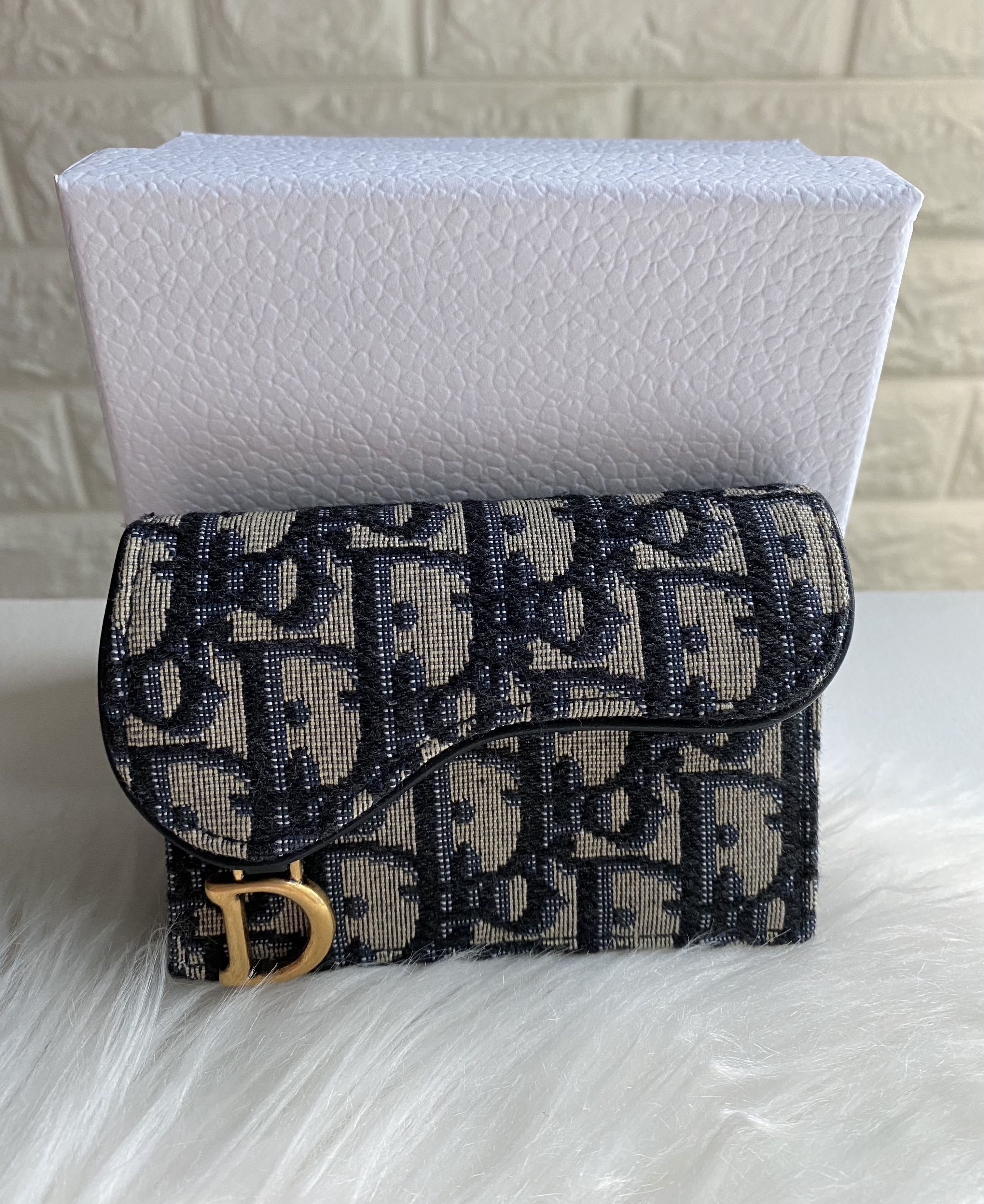 Dior saddle flap card holder price deals