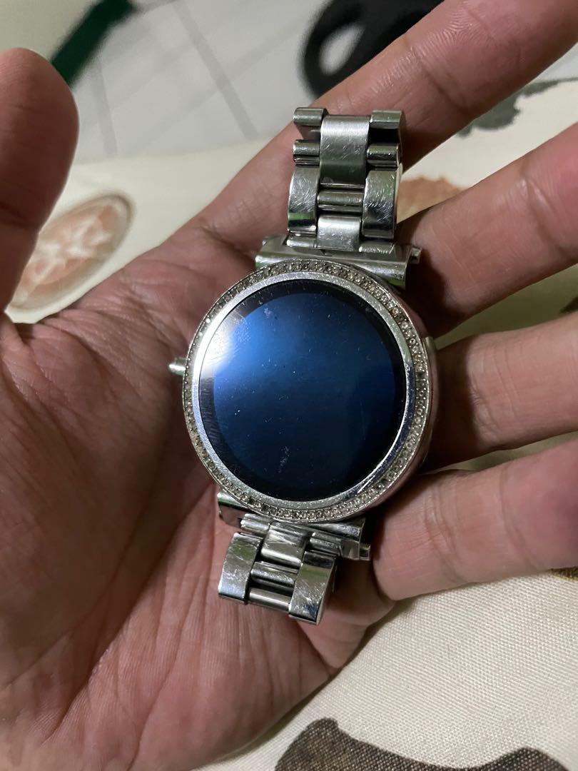 Michael Kors Smartwatch (Category: Women's Watches) located in Manila. Submitted by max0693 (Listing ID 1098194050, Image 1). Description: Completely working and already updated. A few missing stones and no charger(but any smart watch charger works fine with it). Very stylish and has a big screen. Easy to operate. Retail price:18k Go google OS PM me if interested .