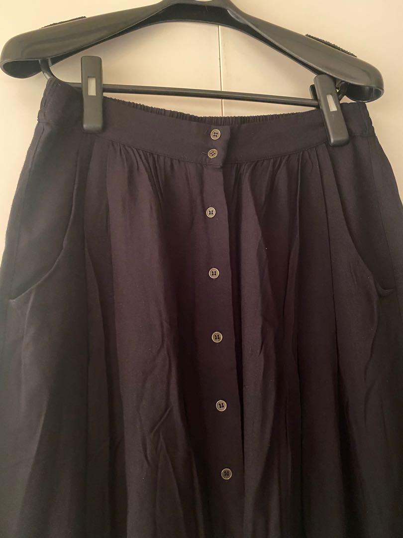 Forever 21 Black Midi A-line Skirt (Category: Skirts) located in Masbate. Submitted by cesscrvnts (Listing ID 1101893126, Image 2). Description: Preloved. No major flaws. Very few signs of use. Measurements when laid flat Waist: 15 inches Length: 26 inches Two functional pockets. All buttons are functional as well. Waist is garterized at the back, can accomodate larger body types. #julysweldo.