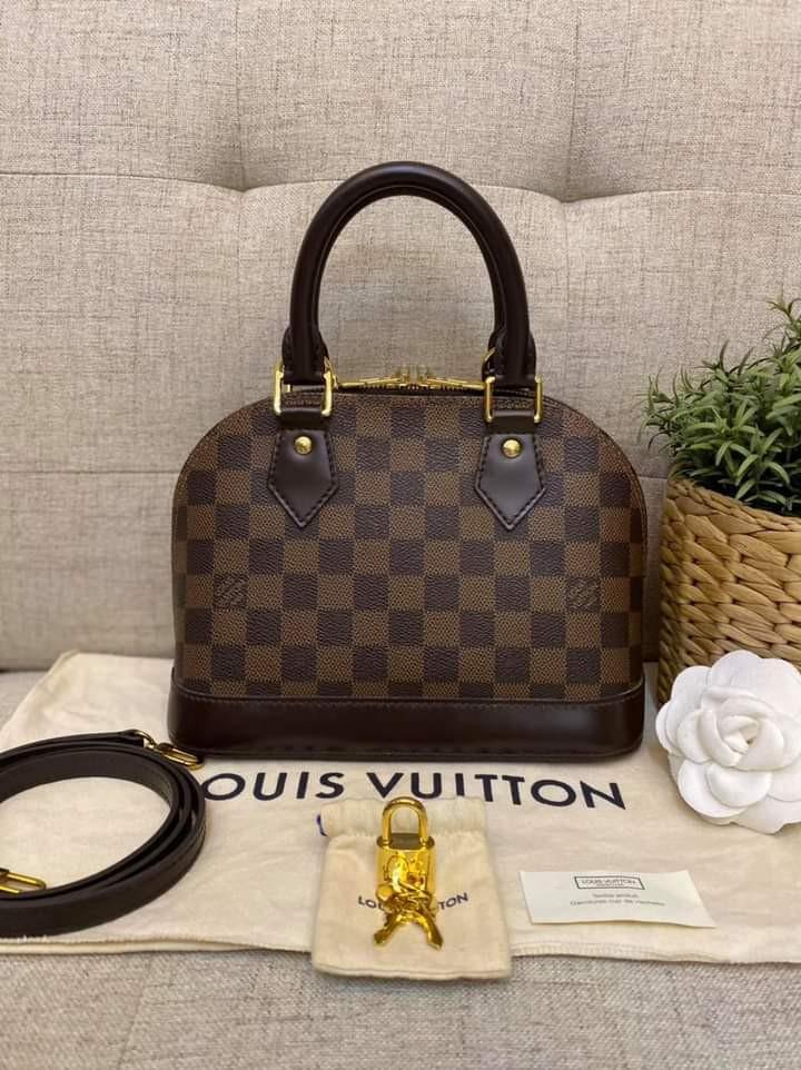 Louis Vuitton Alma BB in Damier Ebene 2017 (Category: Luxury Bags & Wallets) located in Manila. Submitted by bagislifeshop (Listing ID 1102078094, Image 1). Description: Yassss!!! We have one!!! 🌟🌟🌟 On Hand in PH🇵🇭 100% Authentic LV Alma BB in Damier Ebene 2017 Condition: 9/10 Comes with Dustbag, Lockset, Tag and Strap.
