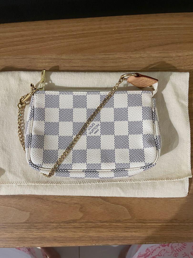 Louis Vuitton Mini Pochette in Damier Azur (Category: Luxury Bags & Wallets) located in Makati City. Submitted by ashasluxurycloset (Listing ID 1102062466, Image 1). Description: L O U I S.V U I T T O N. Mini Pochette in Damier Azur Like New Condition, with dustbag On hand, ready to deliver 100% Original, money back guarantee.