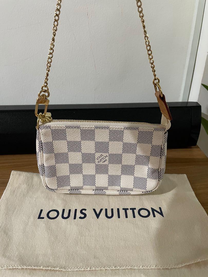 Louis Vuitton Mini Pochette in Damier Azur (Category: Luxury Bags & Wallets) located in Makati City. Submitted by ashasluxurycloset (Listing ID 1102062466, Image 2). Description: L O U I S.V U I T T O N. Mini Pochette in Damier Azur Like New Condition, with dustbag On hand, ready to deliver 100% Original, money back guarantee.