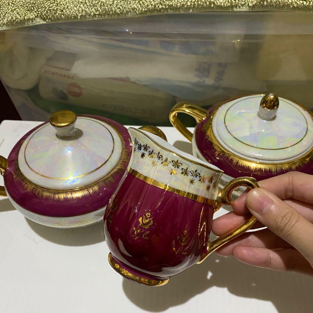 Siroyama Pearlized sugar pot and creamer set (Category: Coffee & Tea Tableware) located in Quezon City. Submitted by kb0030 (Listing ID 1101879499, Image 2). Description: Sold as SET for 1,200 Inclusions: 2 pcs big sugar pot 1 pc creamer pot with beak No chips With rubs on gold and print Brand: Siroyama China.