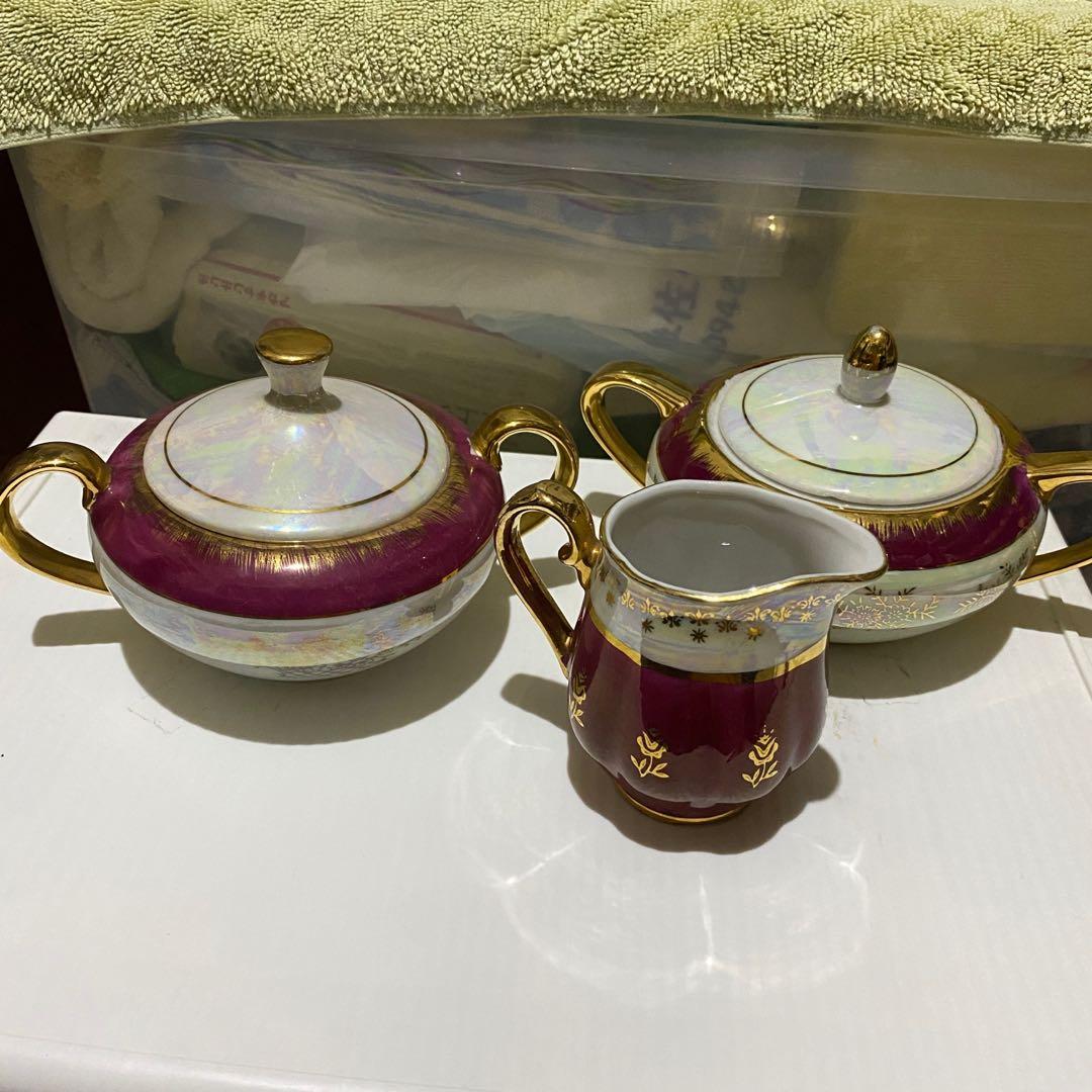 Siroyama Pearlized sugar pot and creamer set (Category: Coffee & Tea Tableware) located in Quezon City. Submitted by kb0030 (Listing ID 1101879499, Image 1). Description: Sold as SET for 1,200 Inclusions: 2 pcs big sugar pot 1 pc creamer pot with beak No chips With rubs on gold and print Brand: Siroyama China.