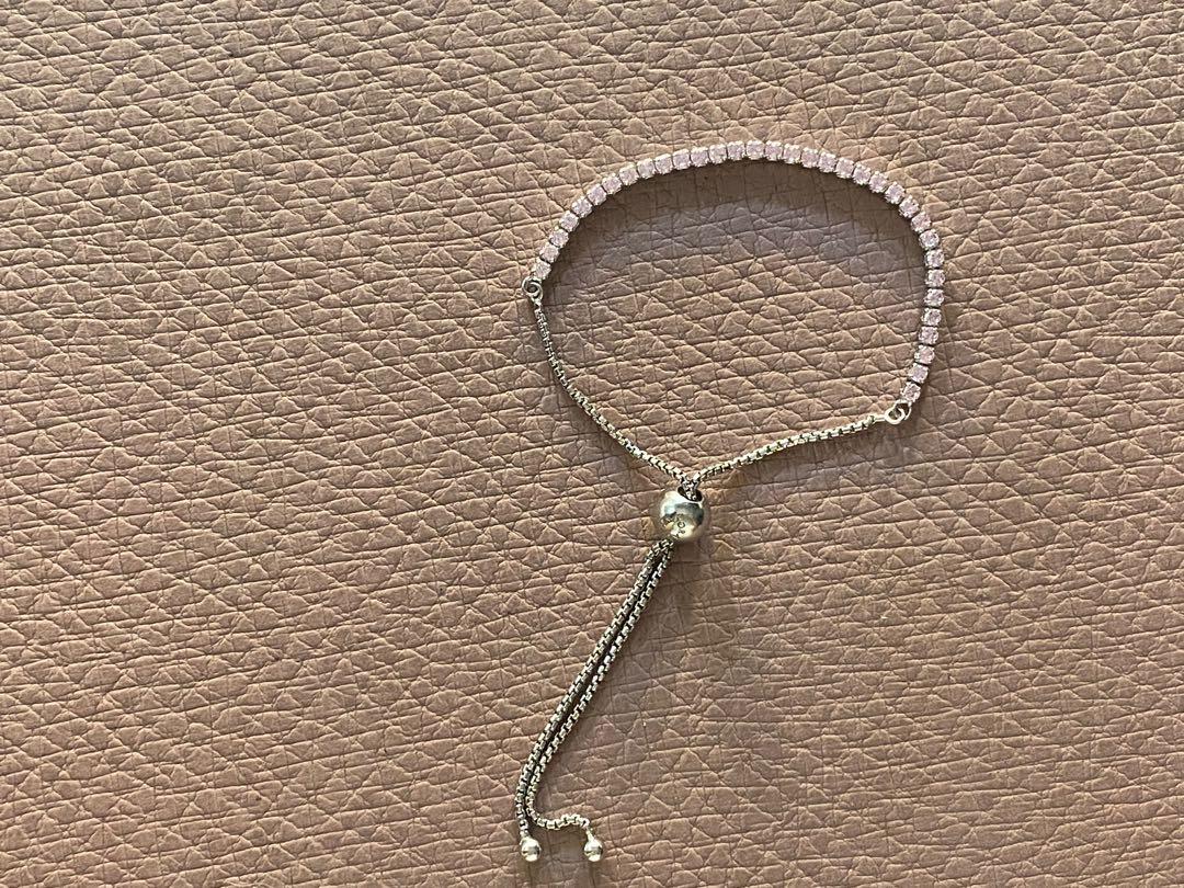 Sterling Silver Pink Stone Adjustable (Category: Bracelets) located in Malolos. Submitted by keepitluxe (Listing ID 1101877171, Image 1). Description: PM for details.