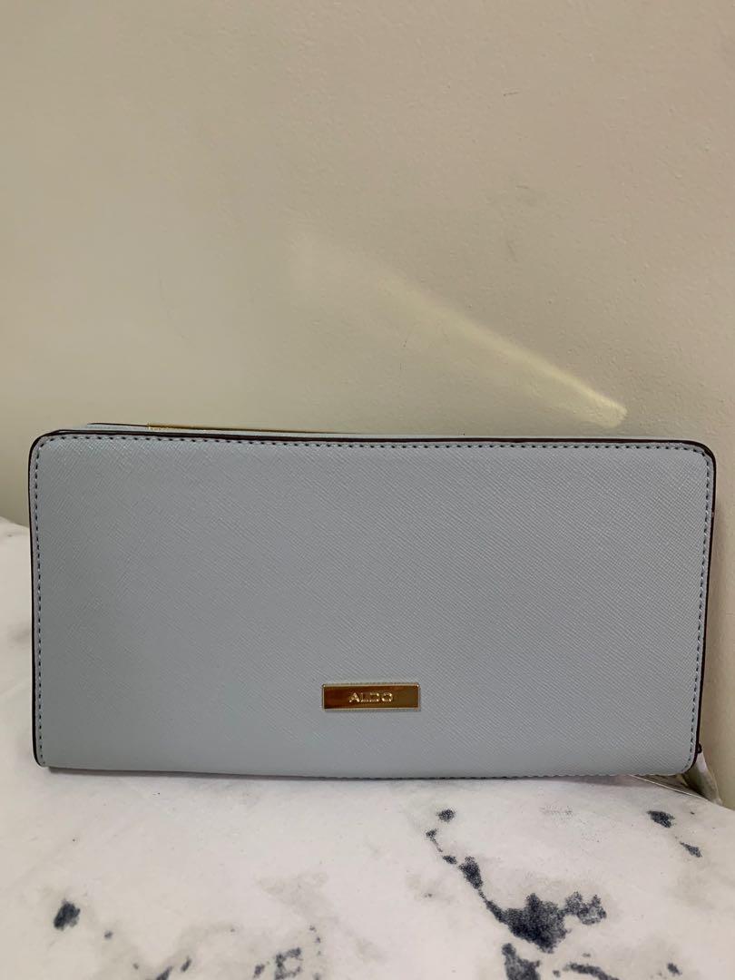 Aldo Pastel Blue Long Wallet (Category: Wallets & Card holders) located in Cainta. Submitted by krouselle (Listing ID 1102346251, Image 1). Description: Aldo Pastel Blue Long Wallet Authentic. Bought from store! Brand new! Sealed with tags. Bought for: 2000 PHP Selling: 1500 PHP - see photos for actual condition - Message for questions! MOP: BDO/GCash/BPI Shipping: JRS/Lalamove.