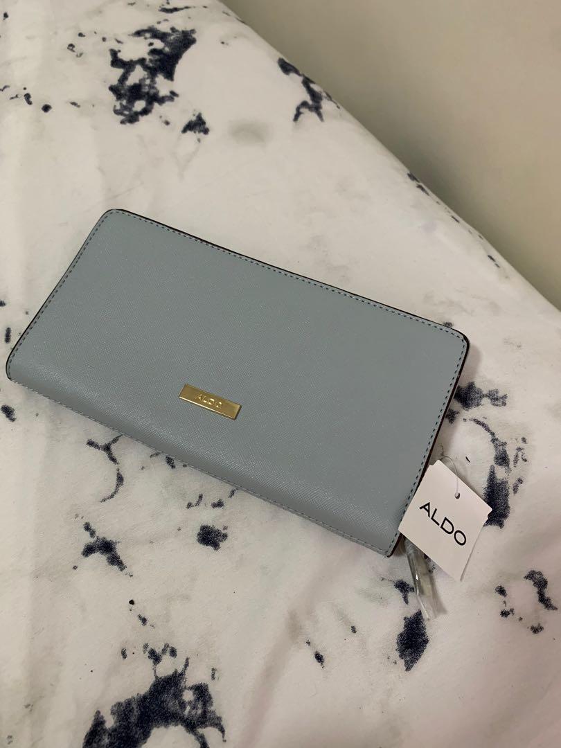 Aldo Pastel Blue Long Wallet (Category: Wallets & Card holders) located in Cainta. Submitted by krouselle (Listing ID 1102346251, Image 3). Description: Aldo Pastel Blue Long Wallet Authentic. Bought from store! Brand new! Sealed with tags. Bought for: 2000 PHP Selling: 1500 PHP - see photos for actual condition - Message for questions! MOP: BDO/GCash/BPI Shipping: JRS/Lalamove.