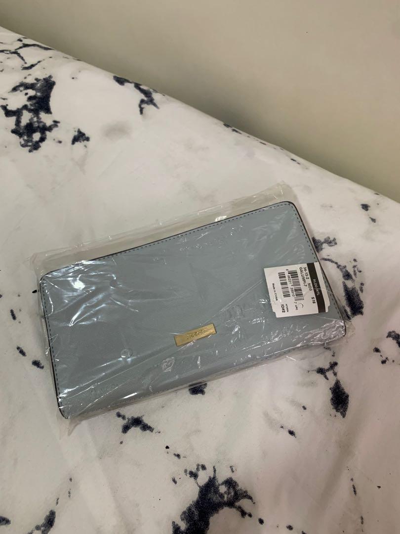 Aldo Pastel Blue Long Wallet (Category: Wallets & Card holders) located in Cainta. Submitted by krouselle (Listing ID 1102346251, Image 2). Description: Aldo Pastel Blue Long Wallet Authentic. Bought from store! Brand new! Sealed with tags. Bought for: 2000 PHP Selling: 1500 PHP - see photos for actual condition - Message for questions! MOP: BDO/GCash/BPI Shipping: JRS/Lalamove.