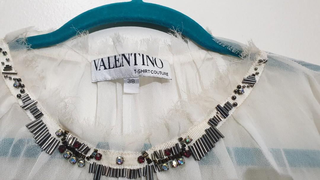 Valentino T-shirt Couture (Category: Blouses) located in Mandaluyong City. Submitted by purselove (Listing ID 1102325171, Image 2). Description: *Authentic, beautiful and definitely unique Valentino T-shirt Couture long sheer viscose top with beaded detailing on cuffs and neckline *May be worn as a top or as a dress with a slip camisole innerwear * Will fit XS to Large but neckline is just a little narrow to fit head through (no buttons) *Last 4 
