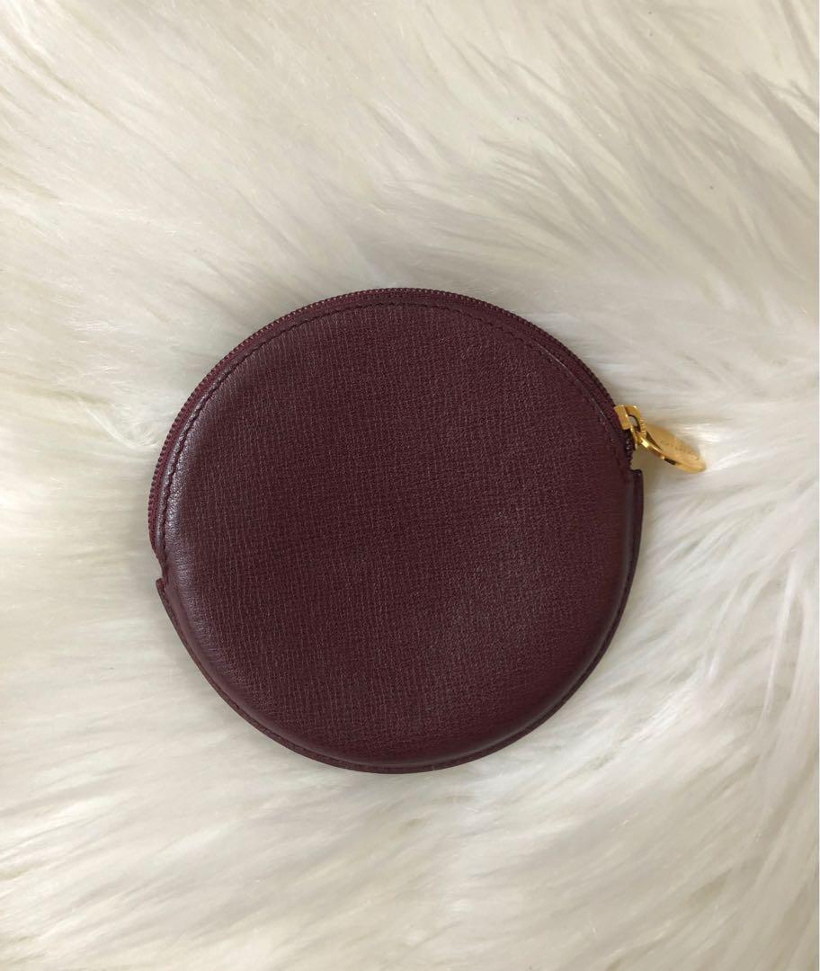 Authentic Cartier Round Coin Case / Purse (Category: Luxury Bags & Wallets) located in Makati City. Submitted by cindiorella (Listing ID 1102604555, Image 2). Description: No inclusions With obvious signs of use With slight storage smell Please see photos carefully for item’s condition.